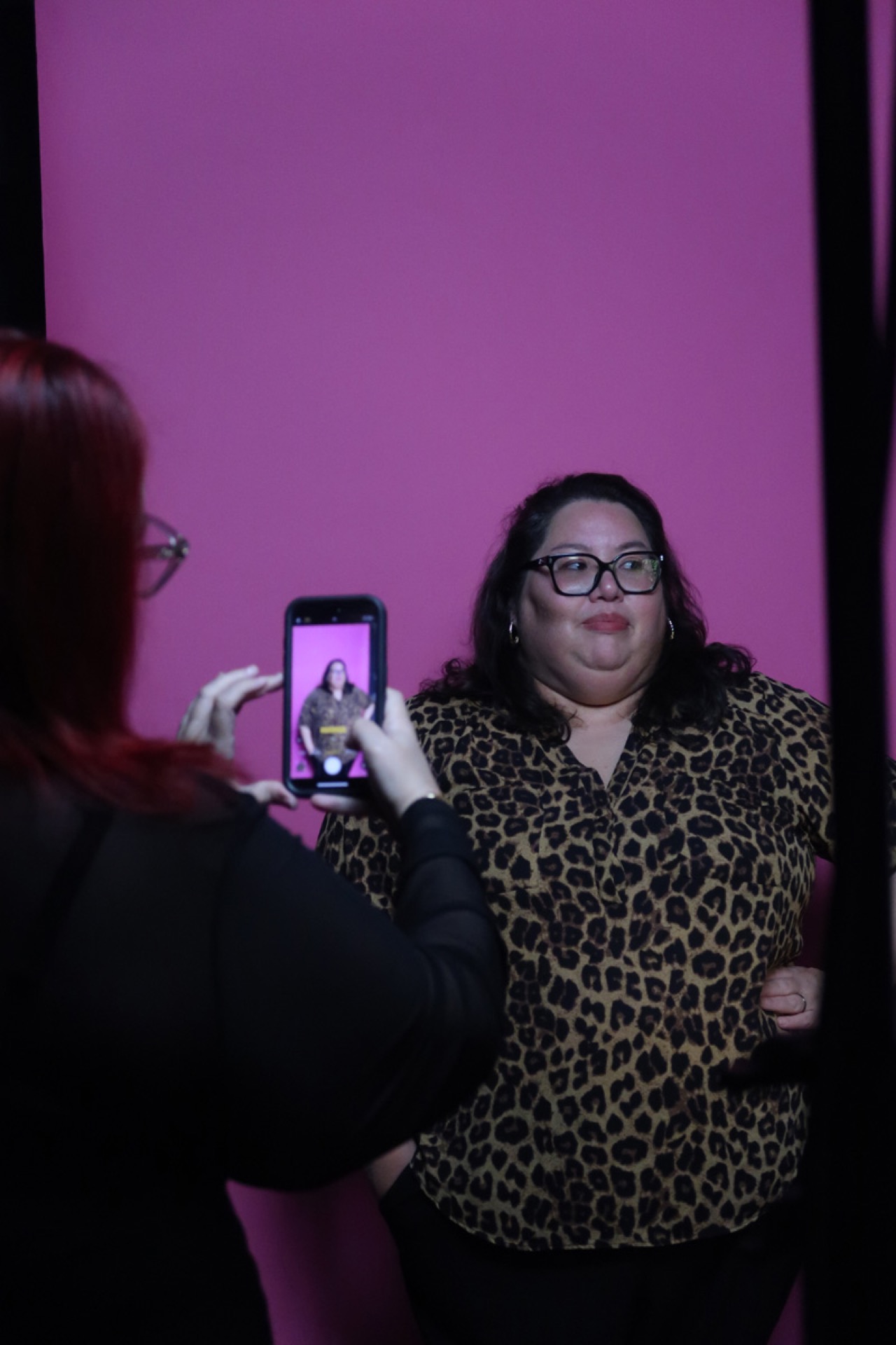 A participant being photographed at the photography workshop