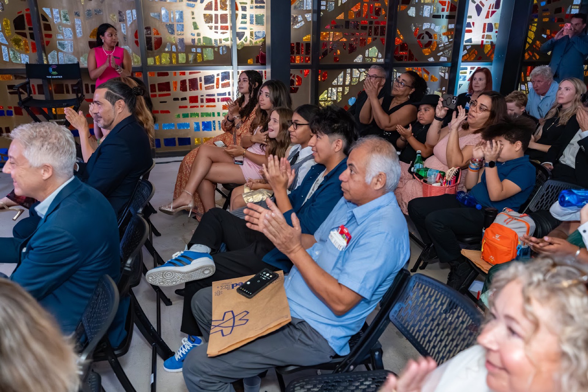 The premiere audience applauding